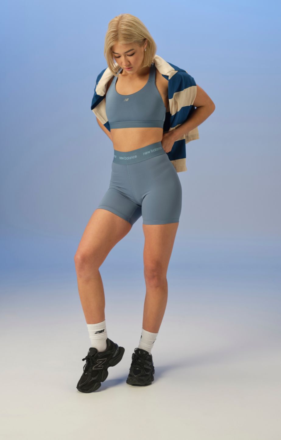 Woman wearing new balance 9060s